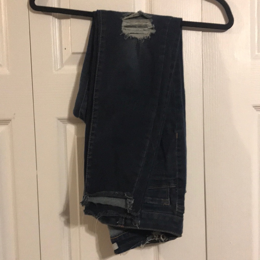 Distressed refuge jeans